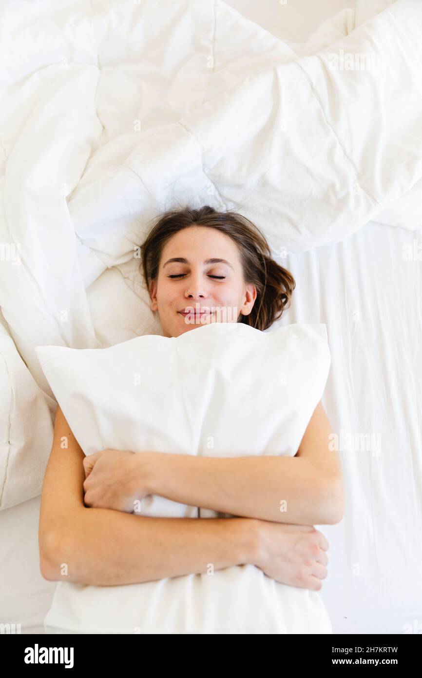 Smiling women sleeping hires stock photography and images Alamy