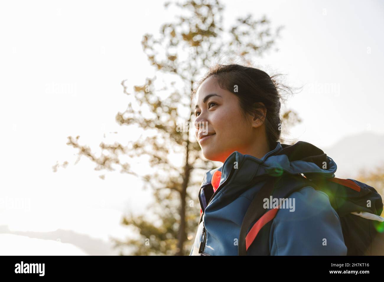 Smiling asian female hiker hi-res stock photography and images - Alamy