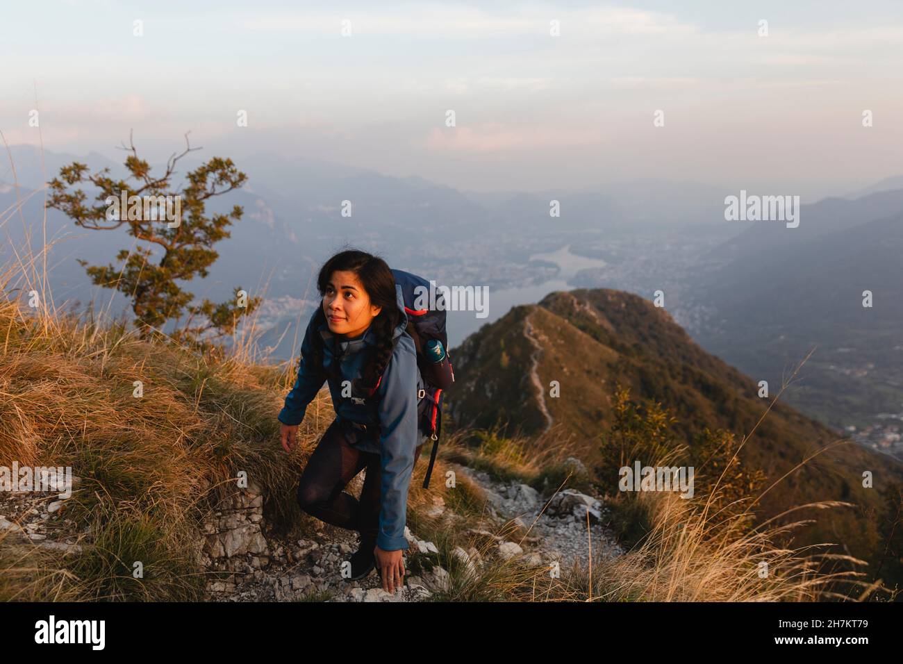 Asian woman climbing mountain hi-res stock photography and images - Alamy