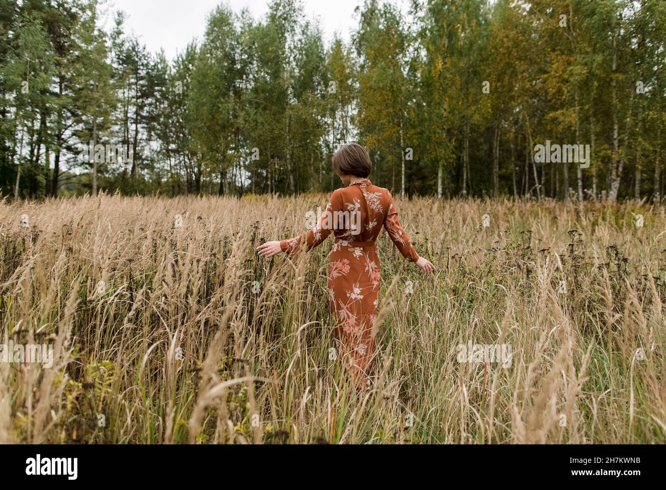 Crop woman walking on field hi-res stock photography and images - Alamy
