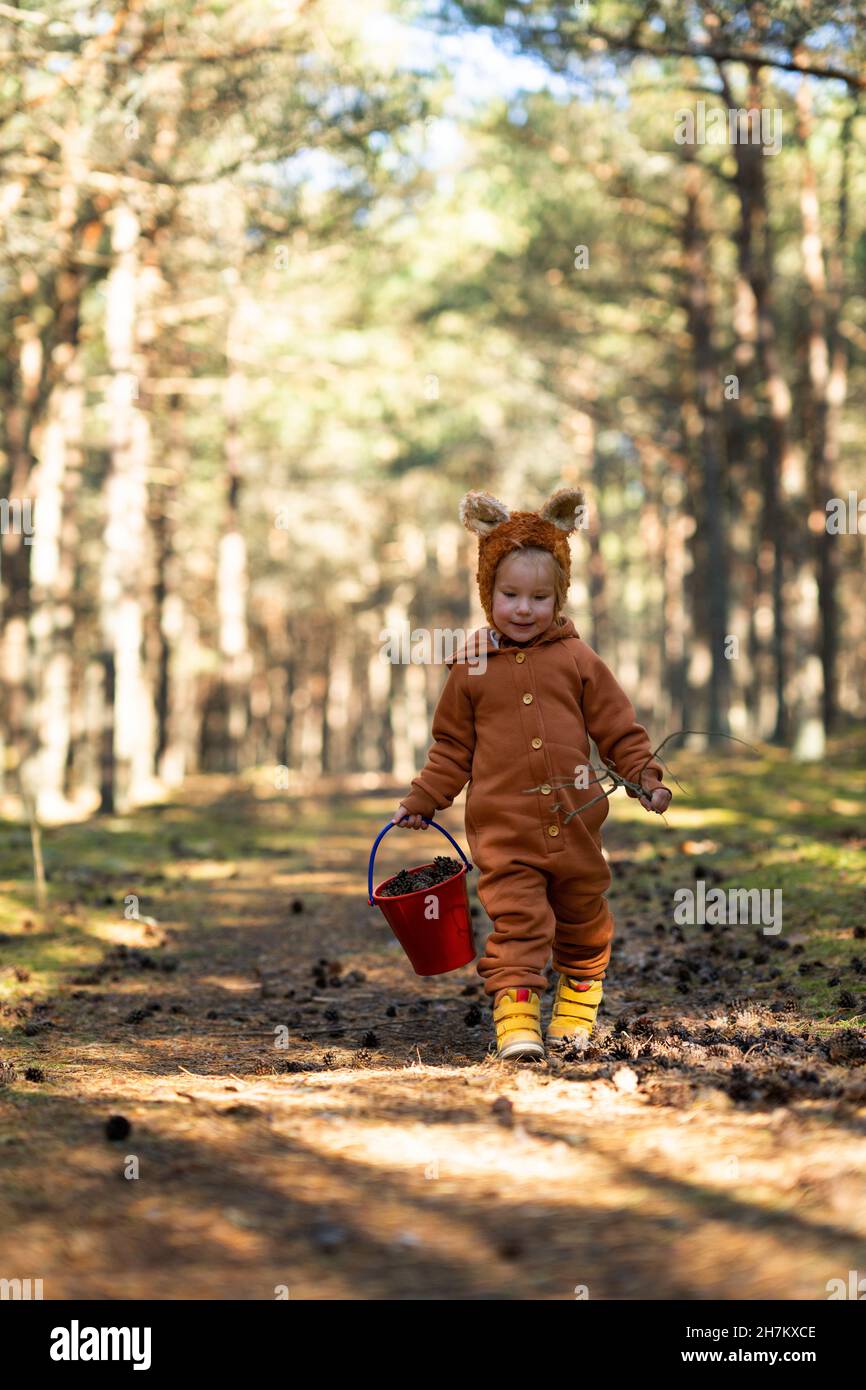 Child walking with bucket hires stock photography and images Alamy