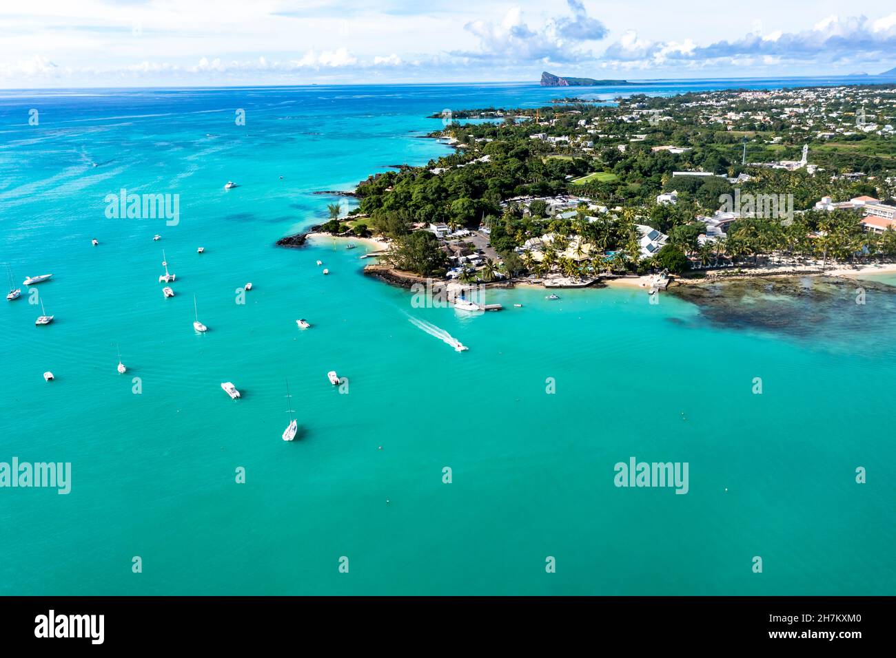 Helicopter view turquoise waters indian ocean coastal town summer hi ...