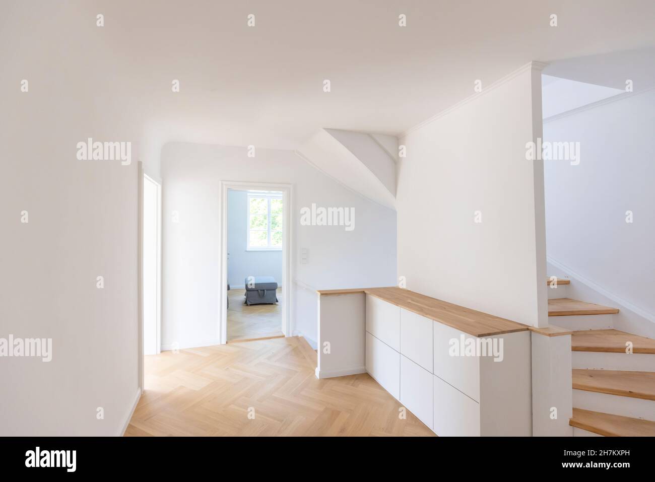 Clean unfurnished home interior with white walls and parquet floor Stock Photo