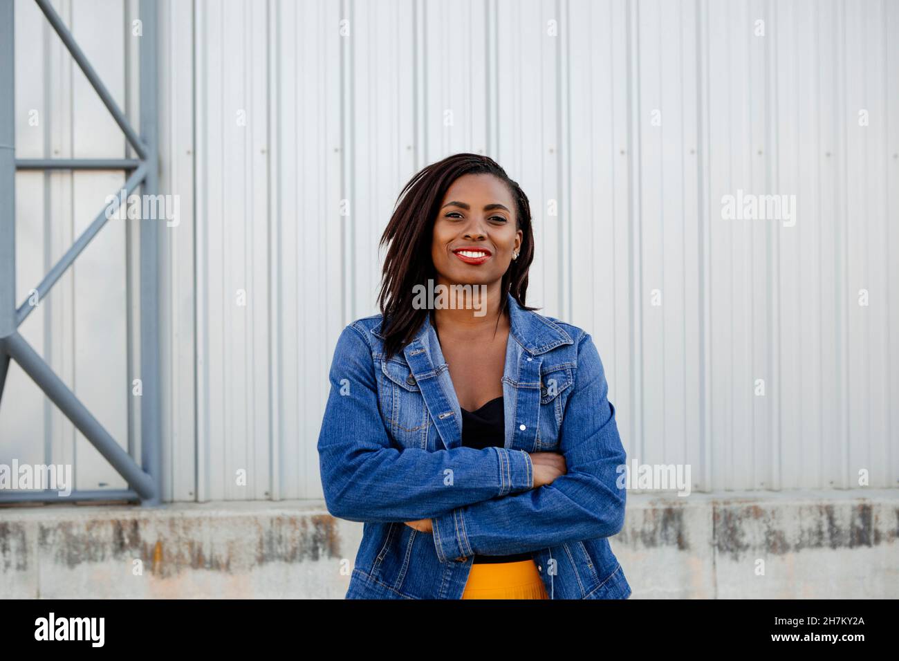 Confident african woman arms hi-res stock photography and images - Alamy