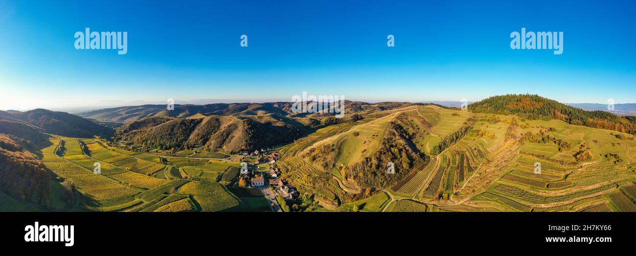 Germany, Baden-Wurttemberg, Vogtsburg im Kaiserstuhl, Aerial panorama of vineyards and volcanic hills of Kaiserstuhl in autumn Stock Photo