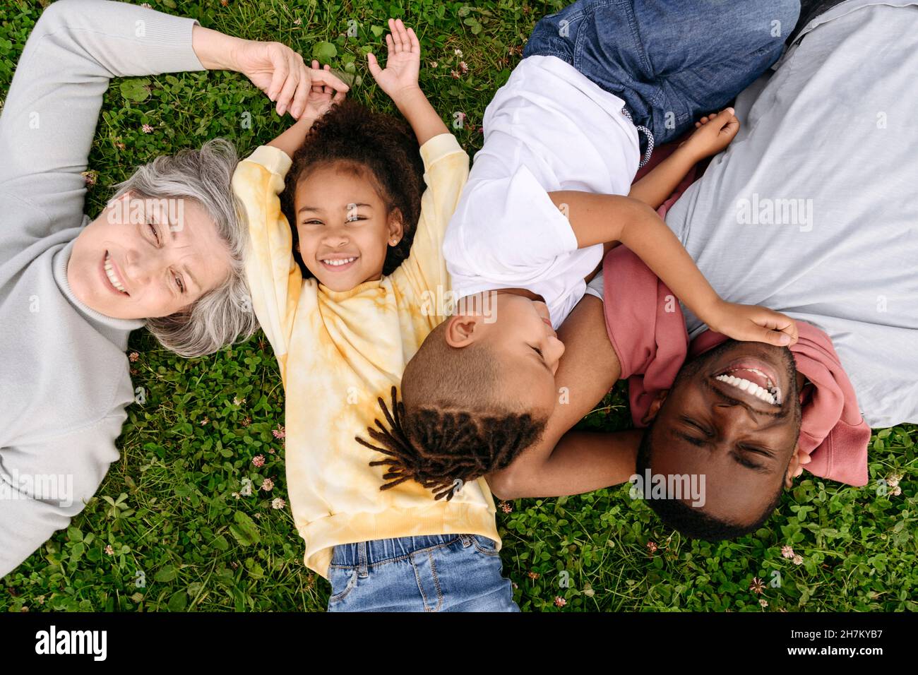 Family group resting hi-res stock photography and images - Alamy