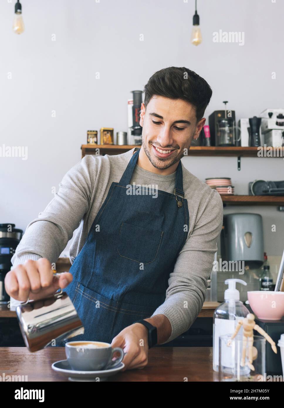 Cafe owner smiling camera hi-res stock photography and images - Alamy