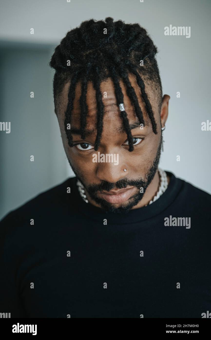 Bearded man curly african hi-res stock photography and images - Alamy