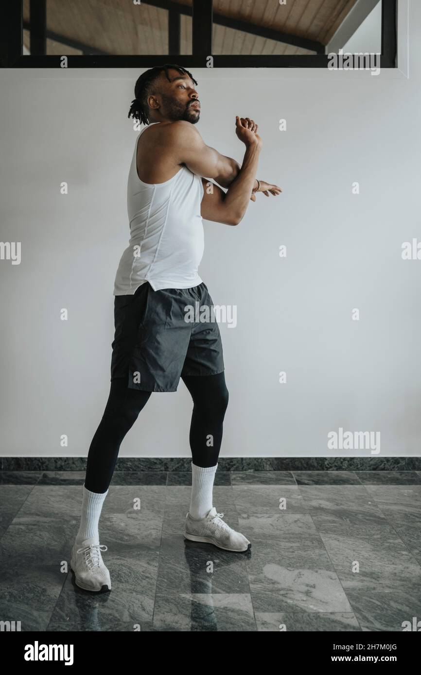 Athlete black man stretching hi-res stock photography and images - Alamy