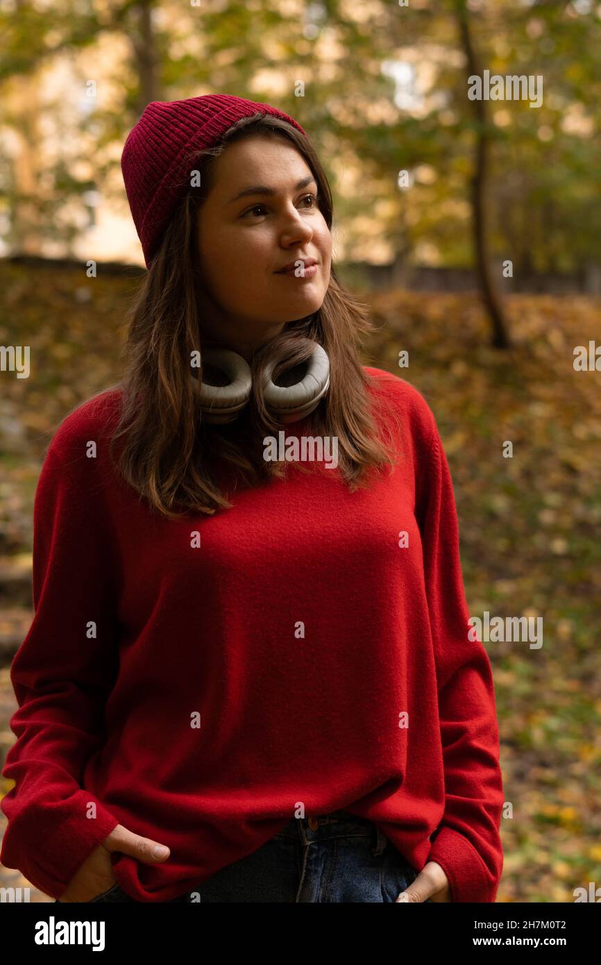 Women in red sweater hi-res stock photography and images - Alamy