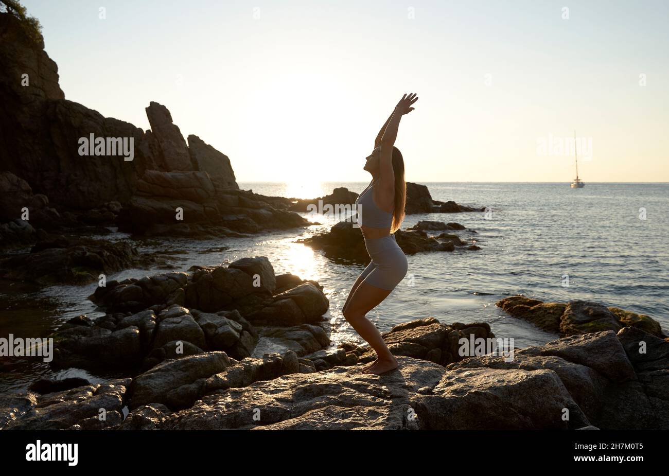 Female athlete raising arms hi-res stock photography and images - Alamy