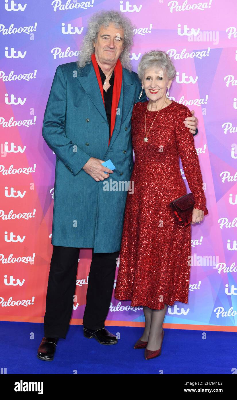 November 23rd, 2021, London, UK. Brian May and Anita Dobson arriving at
