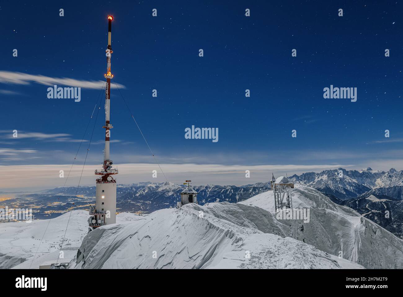 Radio tower Dobratsch under blue sky at Villach, Carinthia, Austria Stock Photo