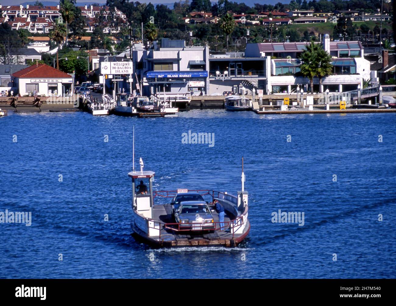 The Balboa Bay Ferry taking cars and people to Balboa Island in Orange County, CA Stock Photo