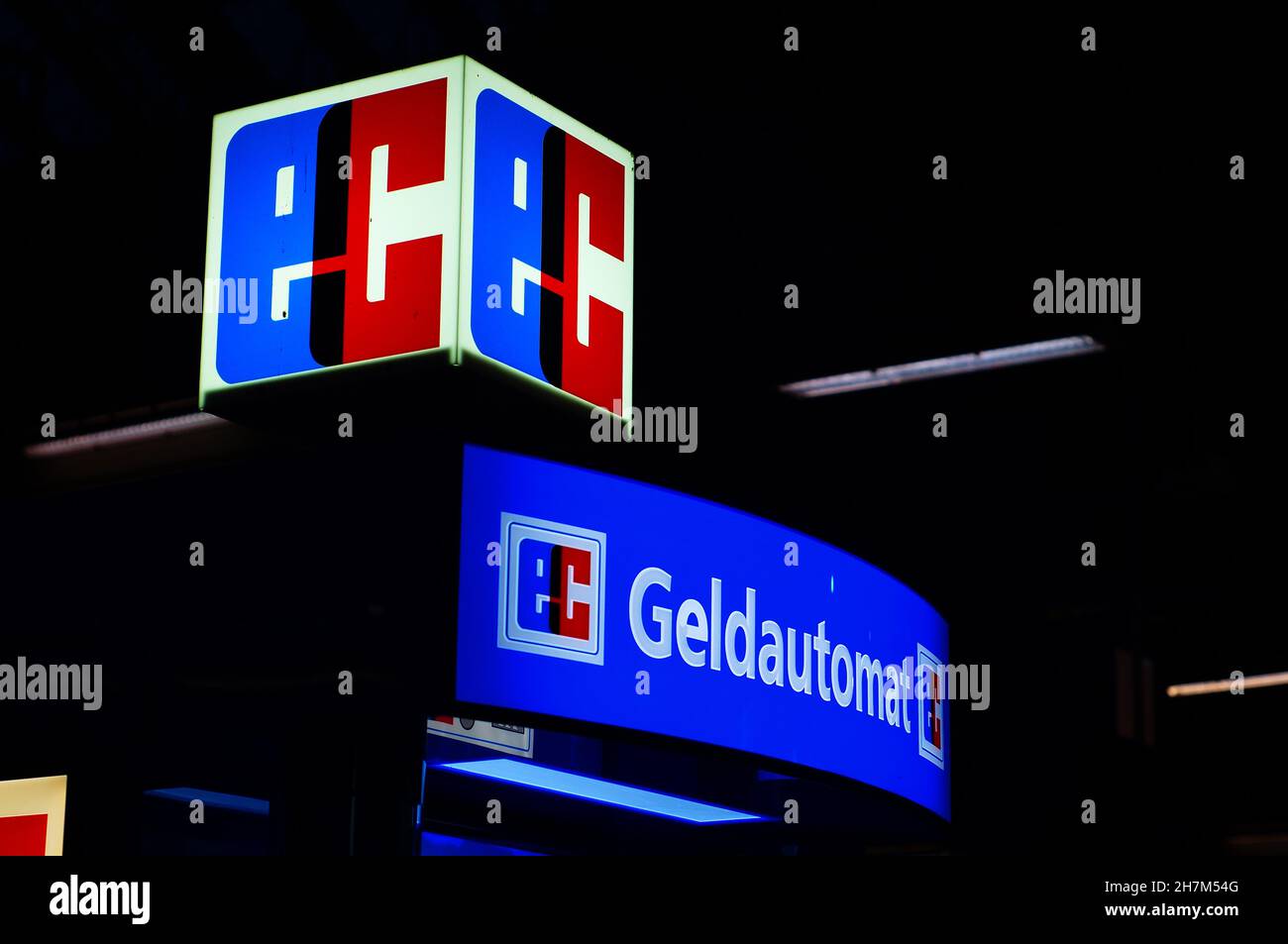 FRANKFURT, GERMANY - Nov 06, 2021: Illuminated display of an ATM at Frankfurt Central Station. Eurocheque-symbol. Stock Photo