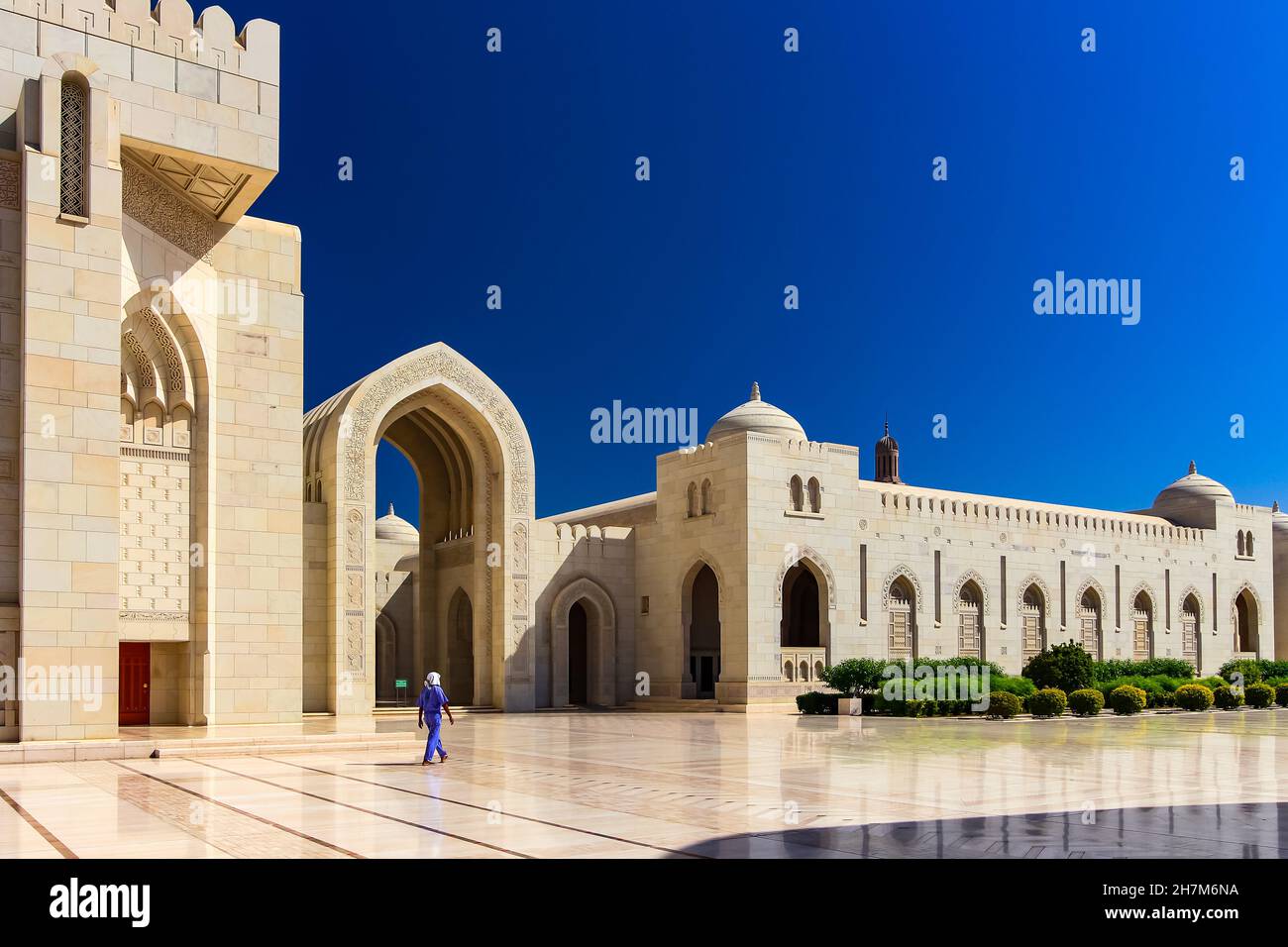 The mighty Sultan Qaboos Mosque in Muscat in Oman is perfectly maintained Stock Photo