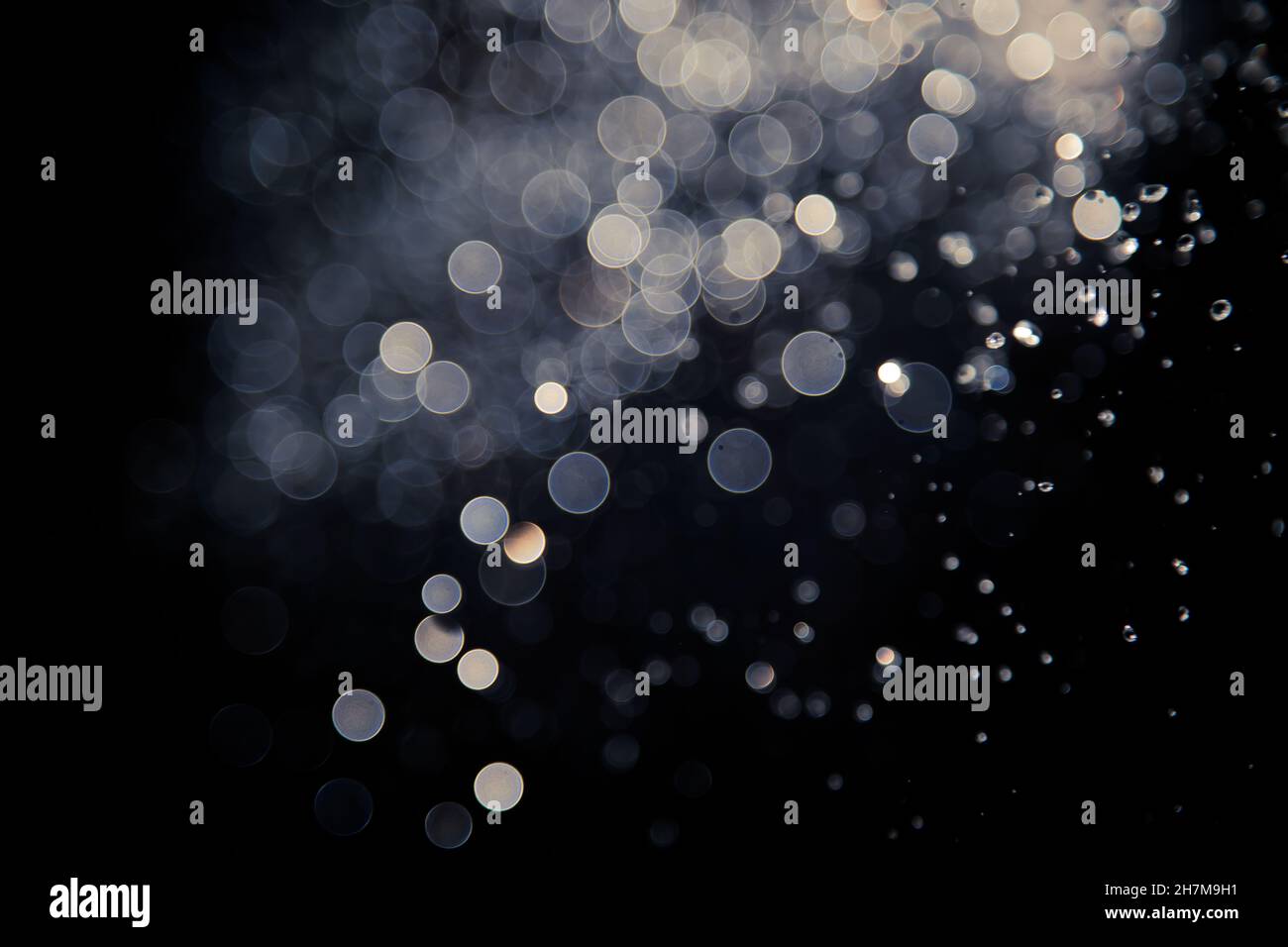 bokeh of lights on black background Stock Photo - Alamy