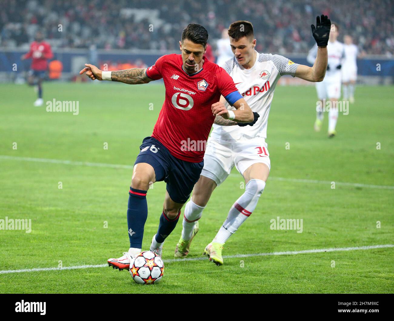 Lille, France, November 23, 2021, Jose Fonte of Lille, Benjamin Sesko of RB Salzburg during the UEFA Champions League, Group G football match between Lille OSC (LOSC) and FC RB Salzburg on November 23, 2021 at Pierre Mauroy stadium in Villeneuve-d'Ascq near Lille, France - Photo Jean Catuffe / DPPI Stock Photo