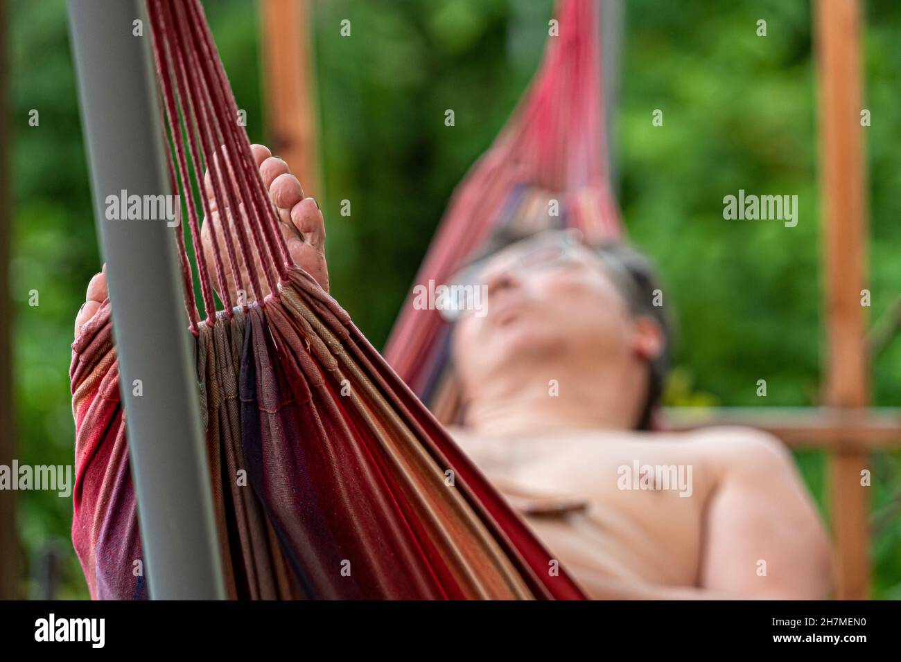 Man in hammock hi-res stock photography and images - Page 23 - Alamy