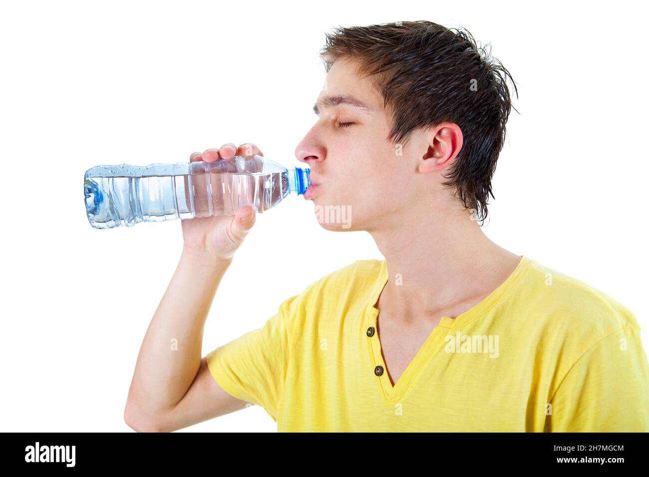 Young Man drinking the Pure Water on the White Background Stock Photo Alamy