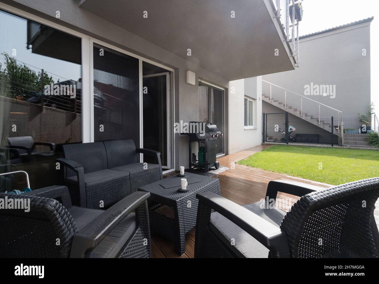 Picture of Small garden and terrace of modern apartment Stock Photo - Alamy