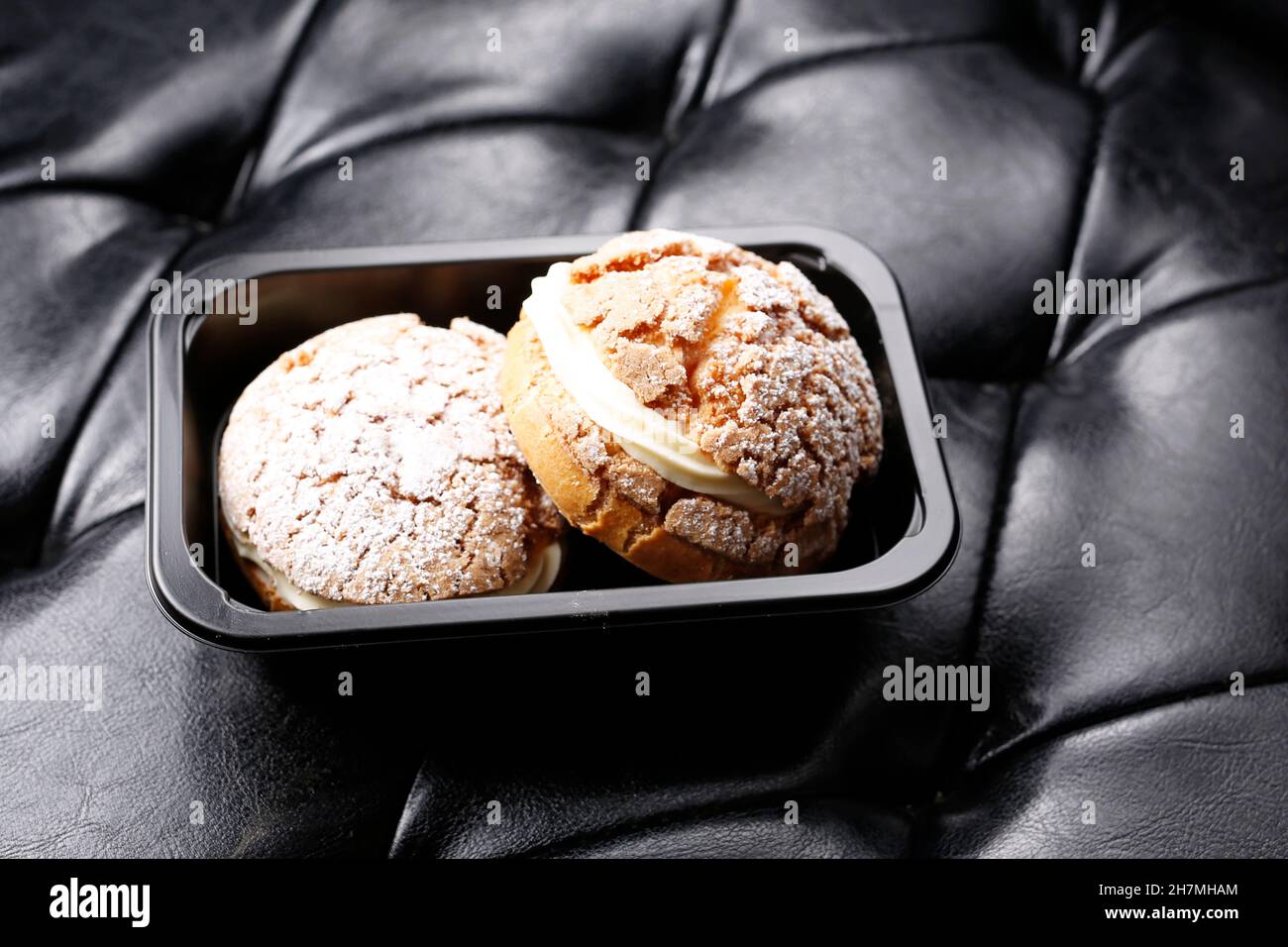 Cream cake, dessert in a takeaway box. A tasty dish.Culinary photography. Suggestion to serve the dish. Stock Photo