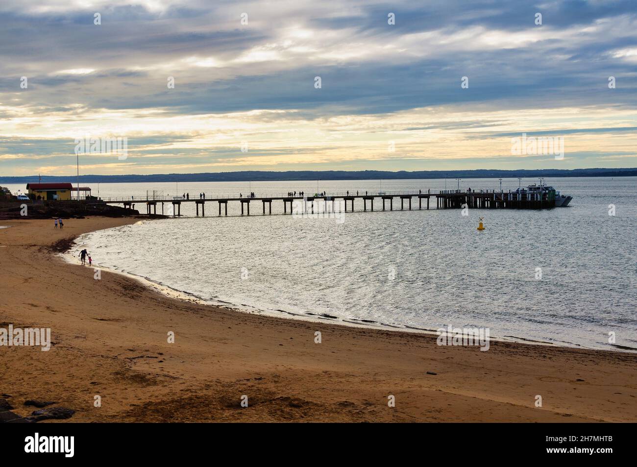 Cowes Jetty on a calm spring evening - Cowes, Victoria, Australia Stock Photo