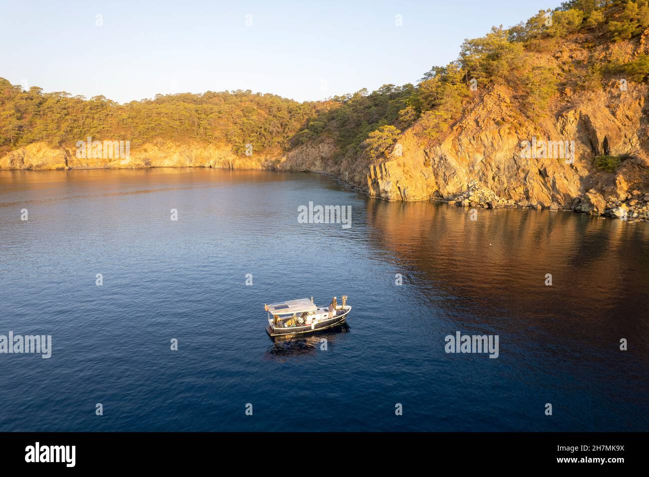 Aeral view of a fishing boat in Göcek Island Muğla Turkey Stock Photo