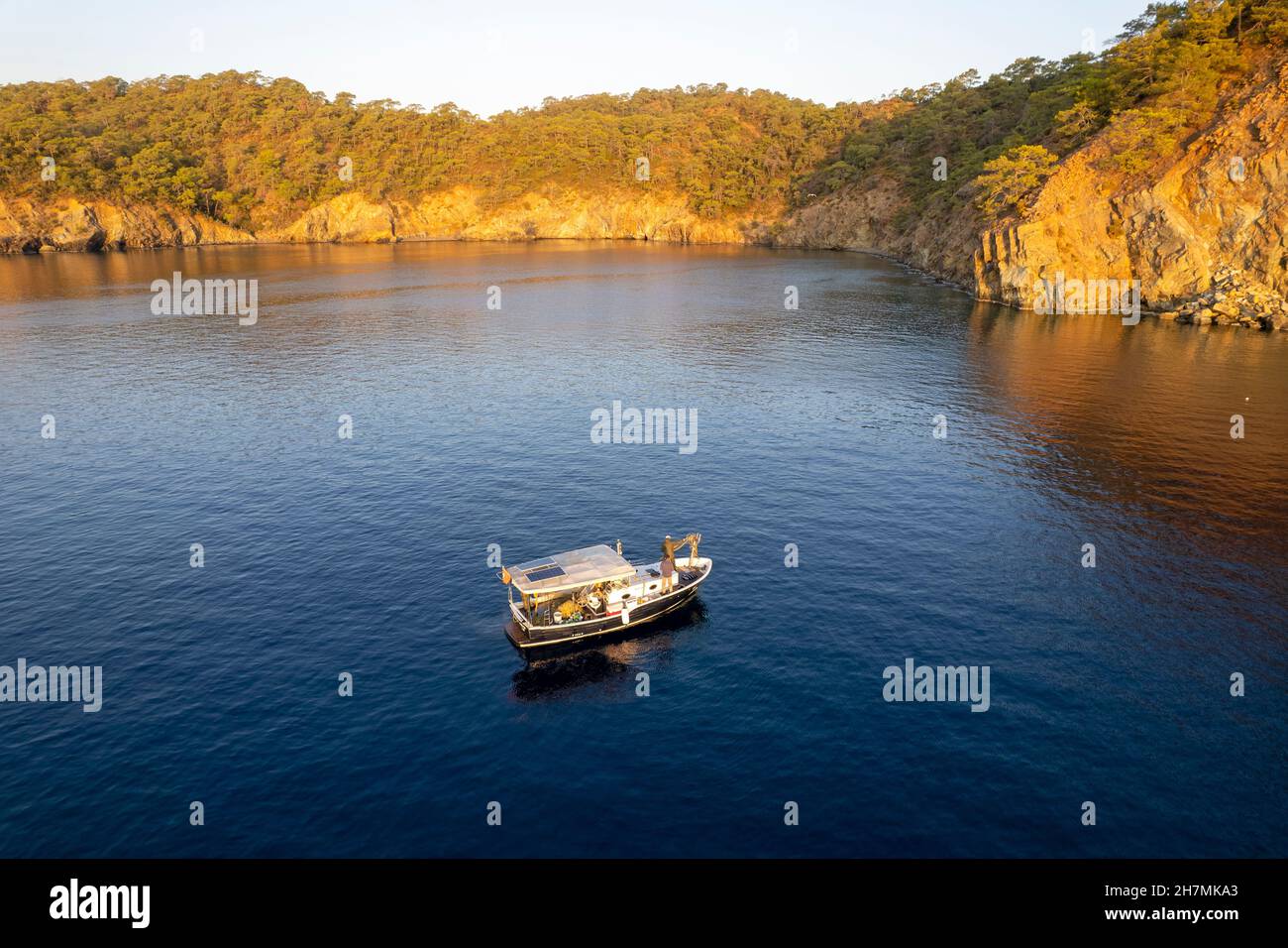 Aeral view of a fishing boat in Göcek Island Muğla Turkey Stock Photo
