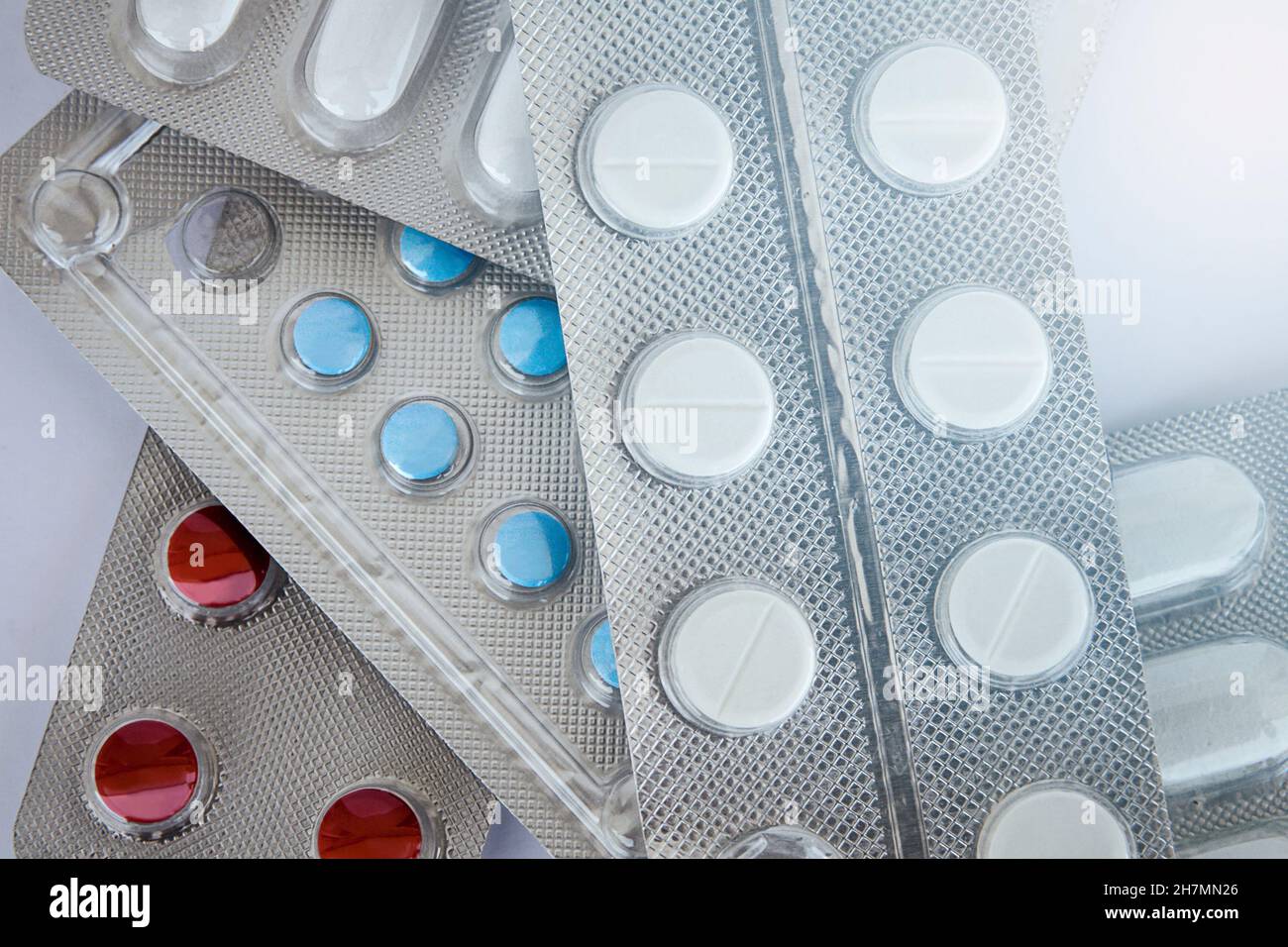 Close-up pile of pills in blister packs Stock Photo