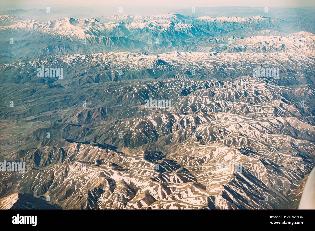 Aerial View Of Mountains Of Urmia Region From Window Of Plane. West Azerbaijan Province, Iran Stock Photo