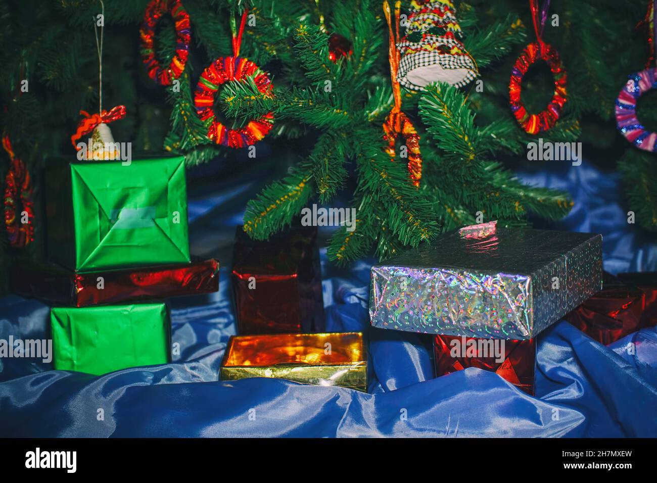 Christmas and New Year gifts in beautiful boxes under the Christmas ...