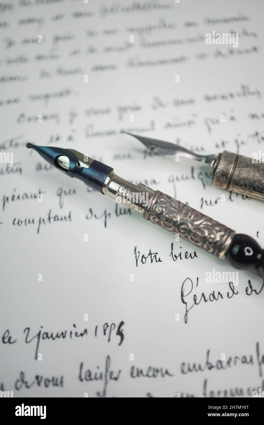 Old fashion writing sample with different writing techniques, papers