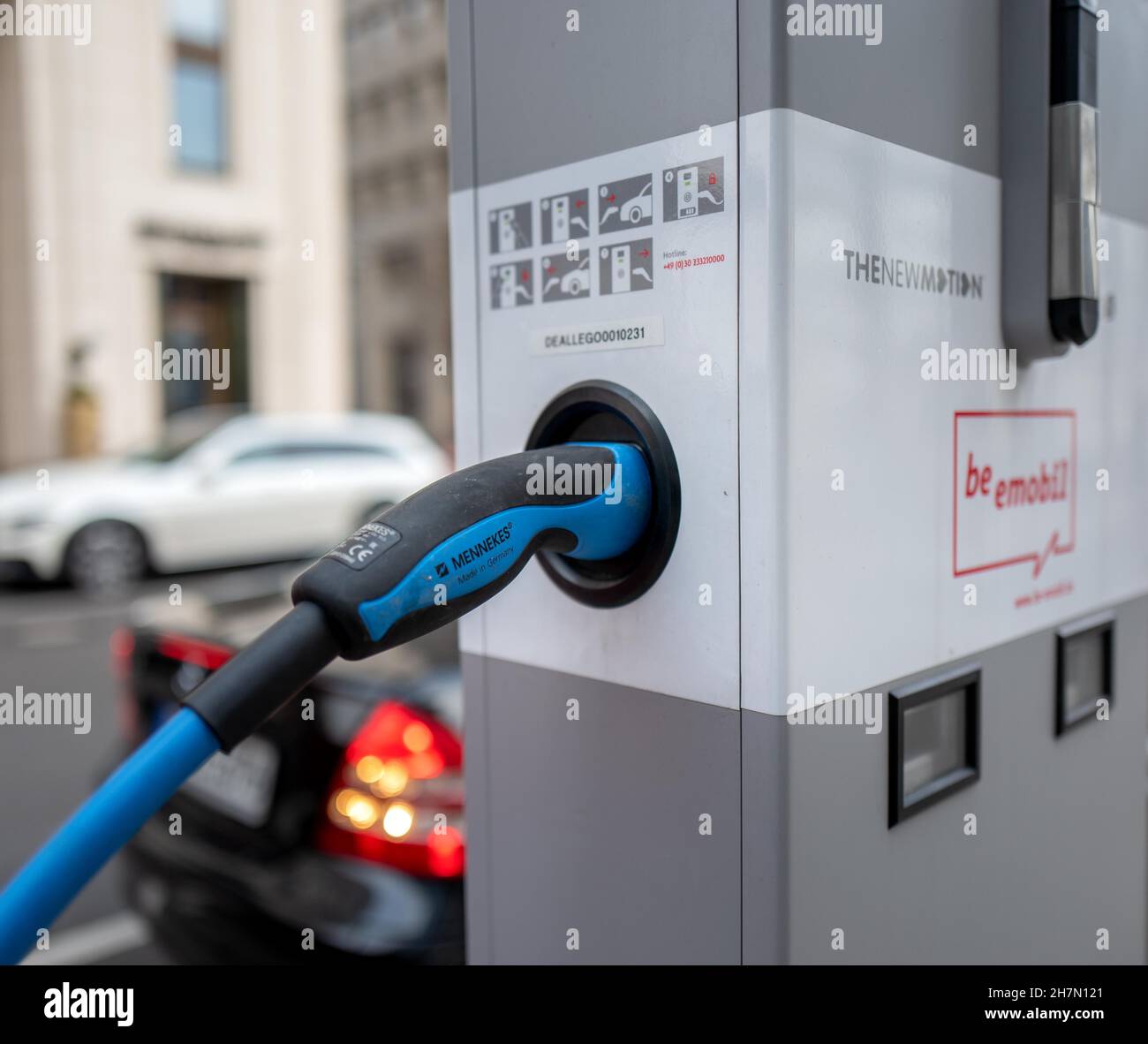 Vehicle charging electricity at the charging station for electric cars