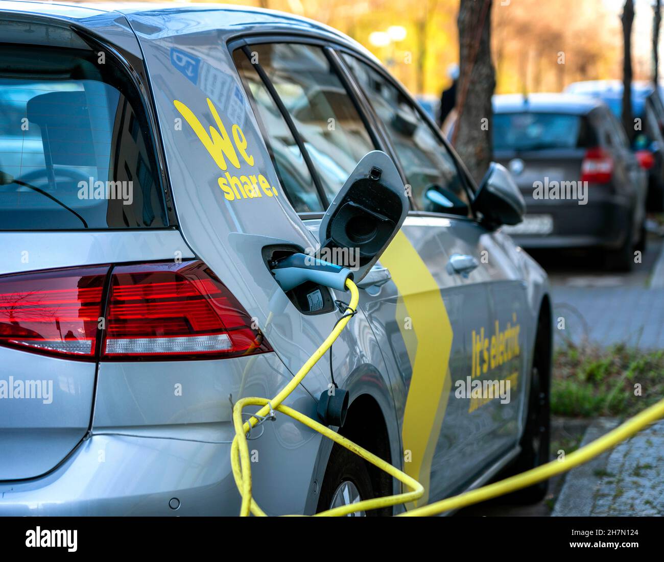 Vehicle charging electricity at the charging station for electric cars
