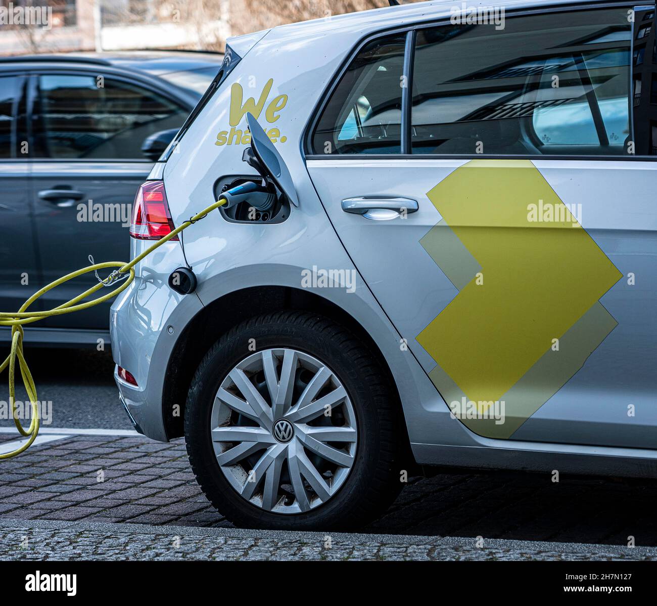 Vehicle charging electricity at the charging station for electric cars