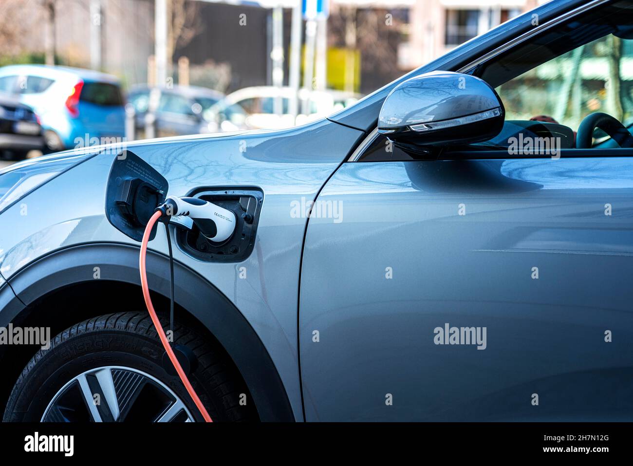 Vehicle charging electricity at the charging station for electric cars