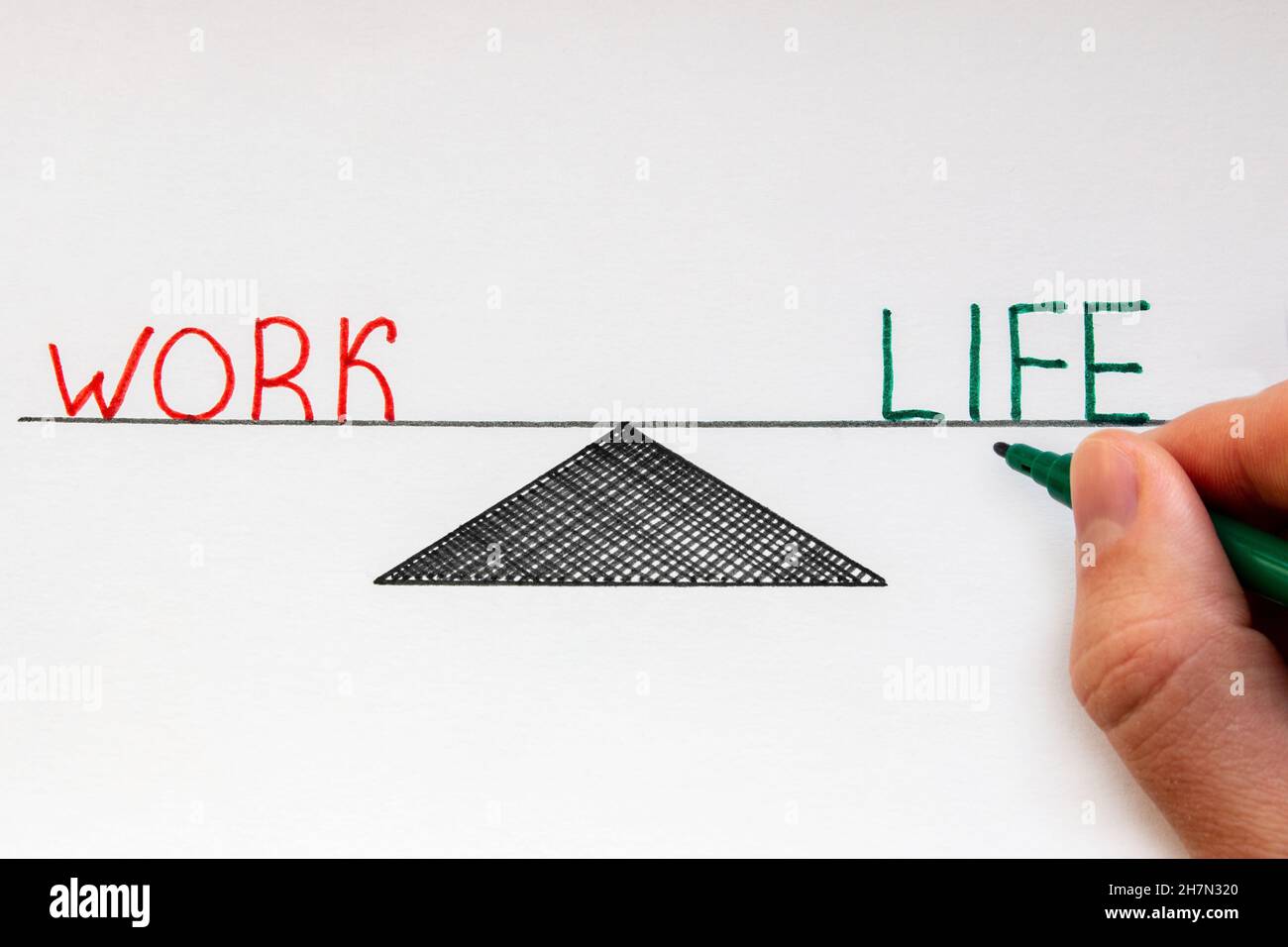 draws in notebook balance work life close-up Stock Photo - Alamy