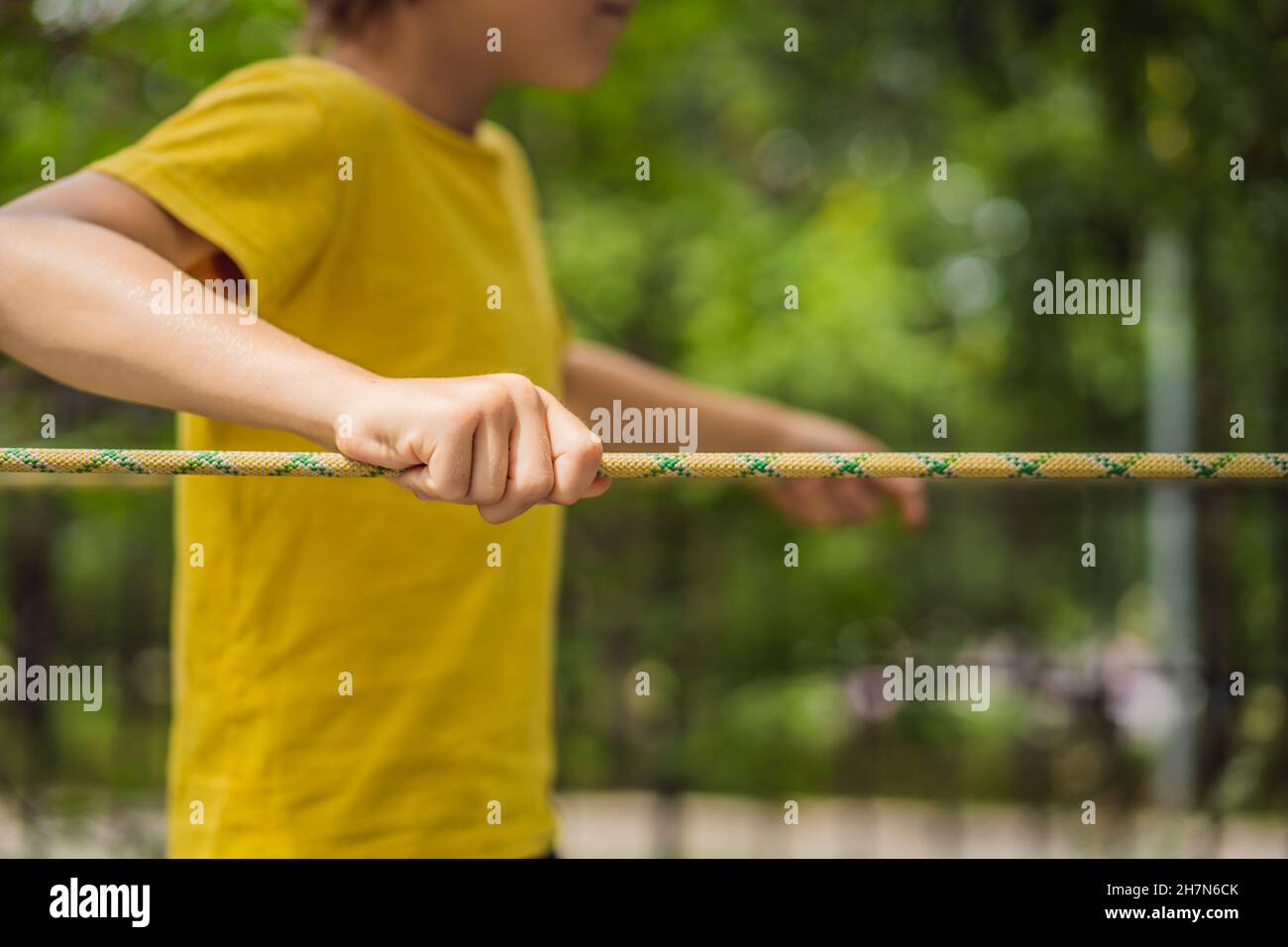Little boy in a rope park. Active physical recreation of the child in ...