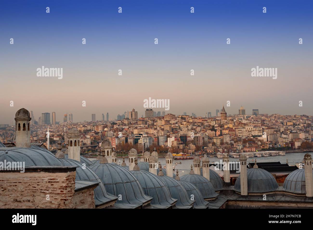 Beautiful Istanbul panorama with the Iconic Galata Tower looking over the Golden Horn at evening time from one of the seven hills, the largest city in Stock Photo