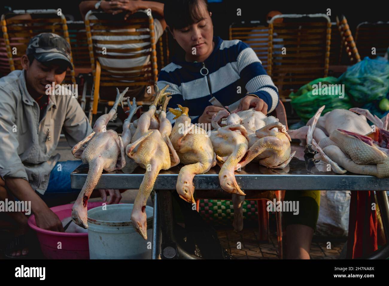 Can tho, Vietnam-April 5, 2018: Vietnamese family sell goose and duck meat  in the streets of Can Tho, Stock Photo