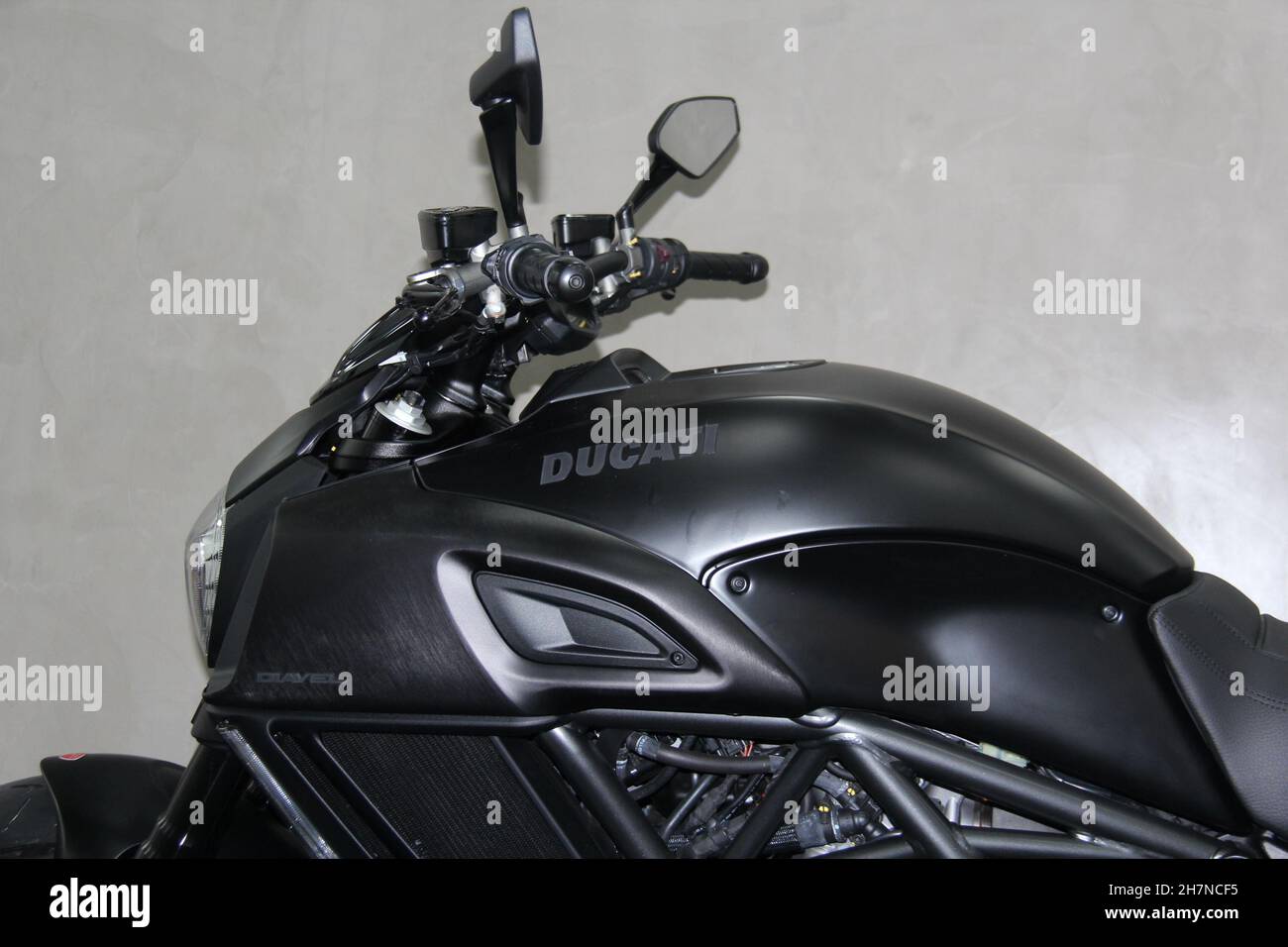 Moto Ducati Diavel Dark: Front side view, black, isolated on display at a  dealership in São Paulo - São Paulo - Brazil. March 2017 Stock Photo - Alamy
