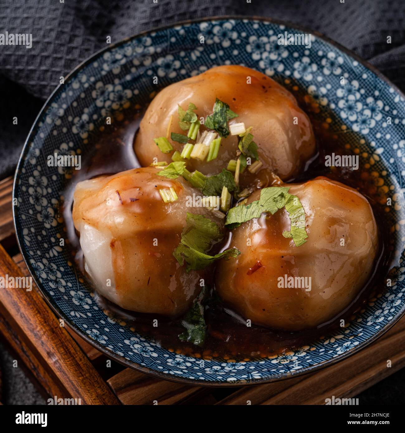 Close up of Bawan (Ba wan), Taiwanese meatball delicacy, delicious street food, steamed starch wrapped round shaped dumpling with pork and shrimp insi Stock Photo