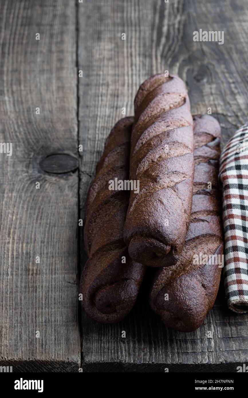 Mini Rye Loaf Mini rye loafs on rustic wooden table Stock Photo - Alamy