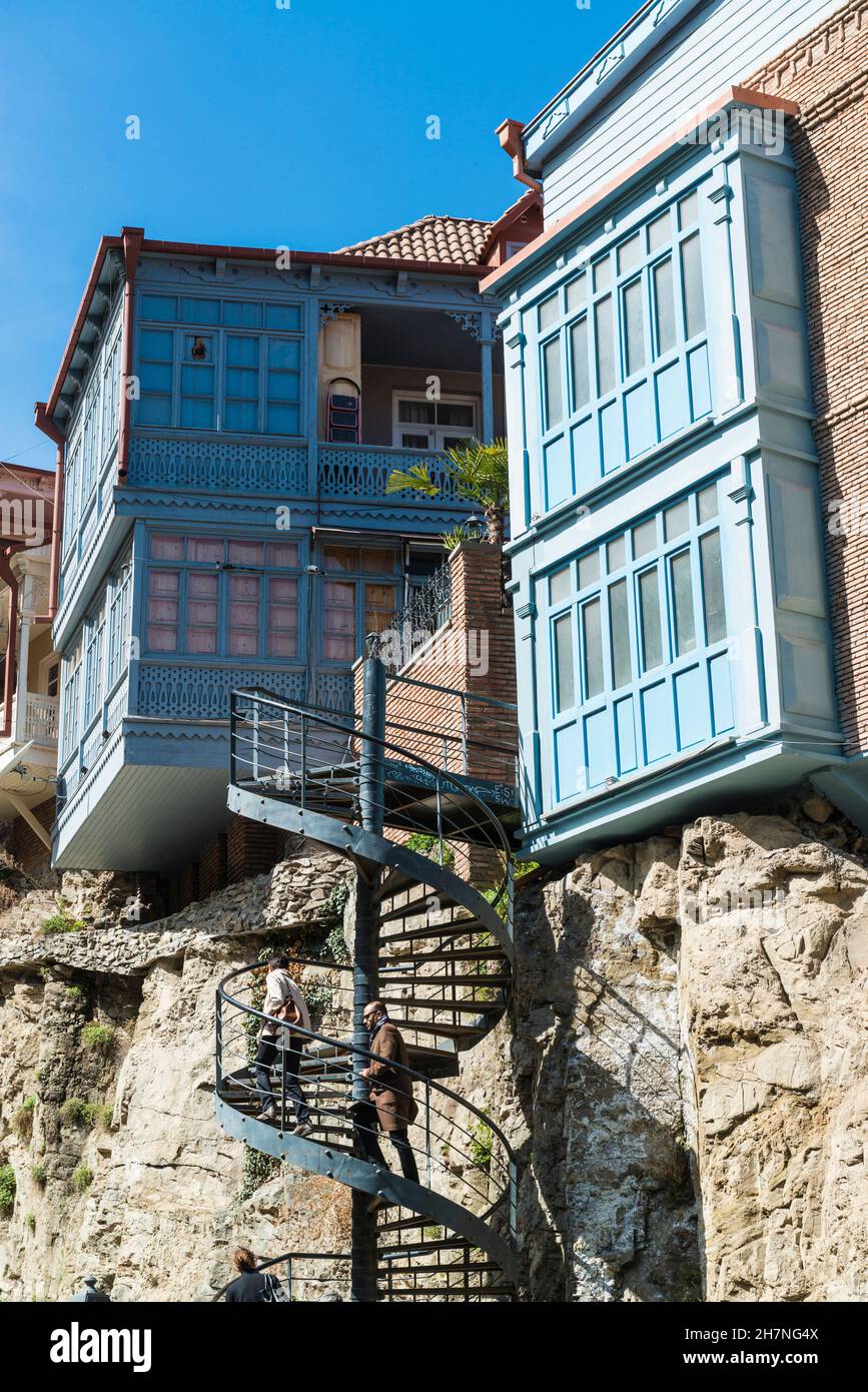 Historic wooden houses with open, carved balconies in the Abanotubani area  of the Old Town of Tblisi, Georgia, Caucasus. Stock Photo