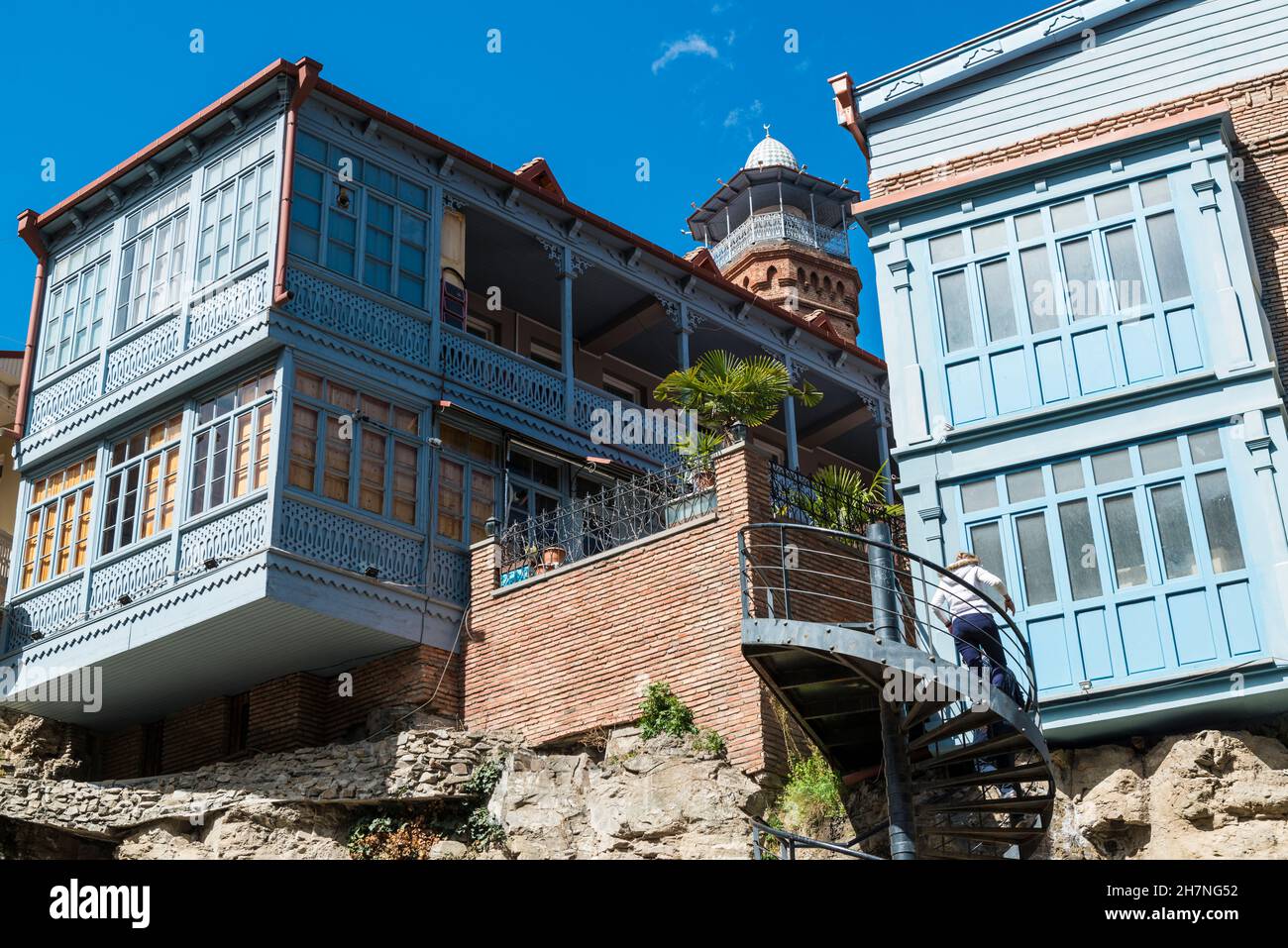 Historic wooden houses with open, carved balconies in the Abanotubani area  of the Old Town of Tblisi, Georgia, Caucasus. Stock Photo