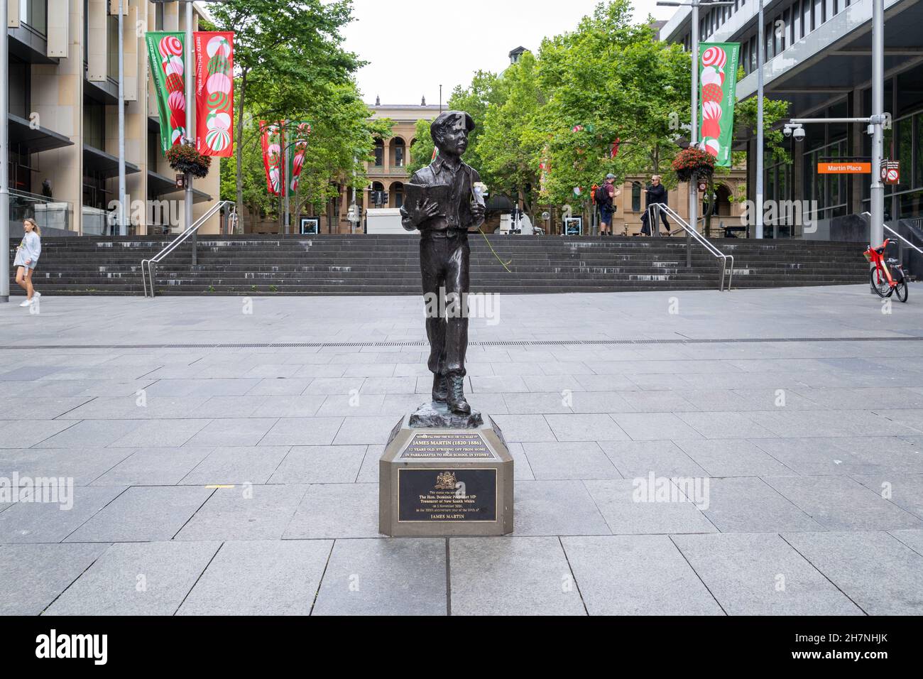 James Martin statue is famous tourist attraction at Martin Place in Sydney. Australia on 20 November 2021. City buildings and a few people can be seen Stock Photo