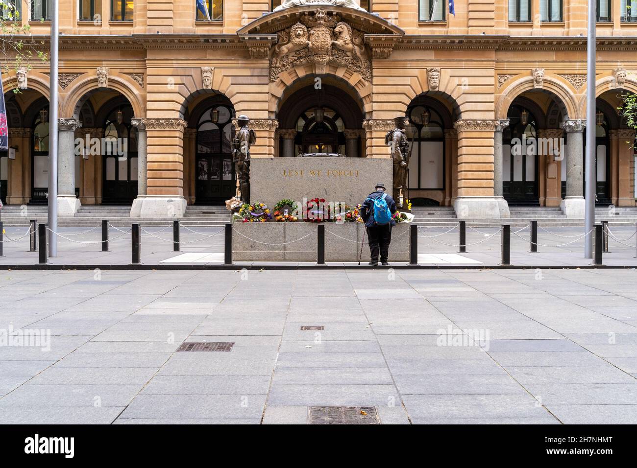 Man paying tribute at Sydney Cenotaph. Heritage-listed World War One monument located in Martin Place, in the Sydney, Australia. Stock Photo