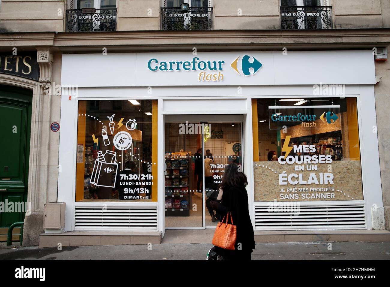 Signage outside the autonomous, checkout-free Carrefour Flash store with 60  cameras to identify products, improve