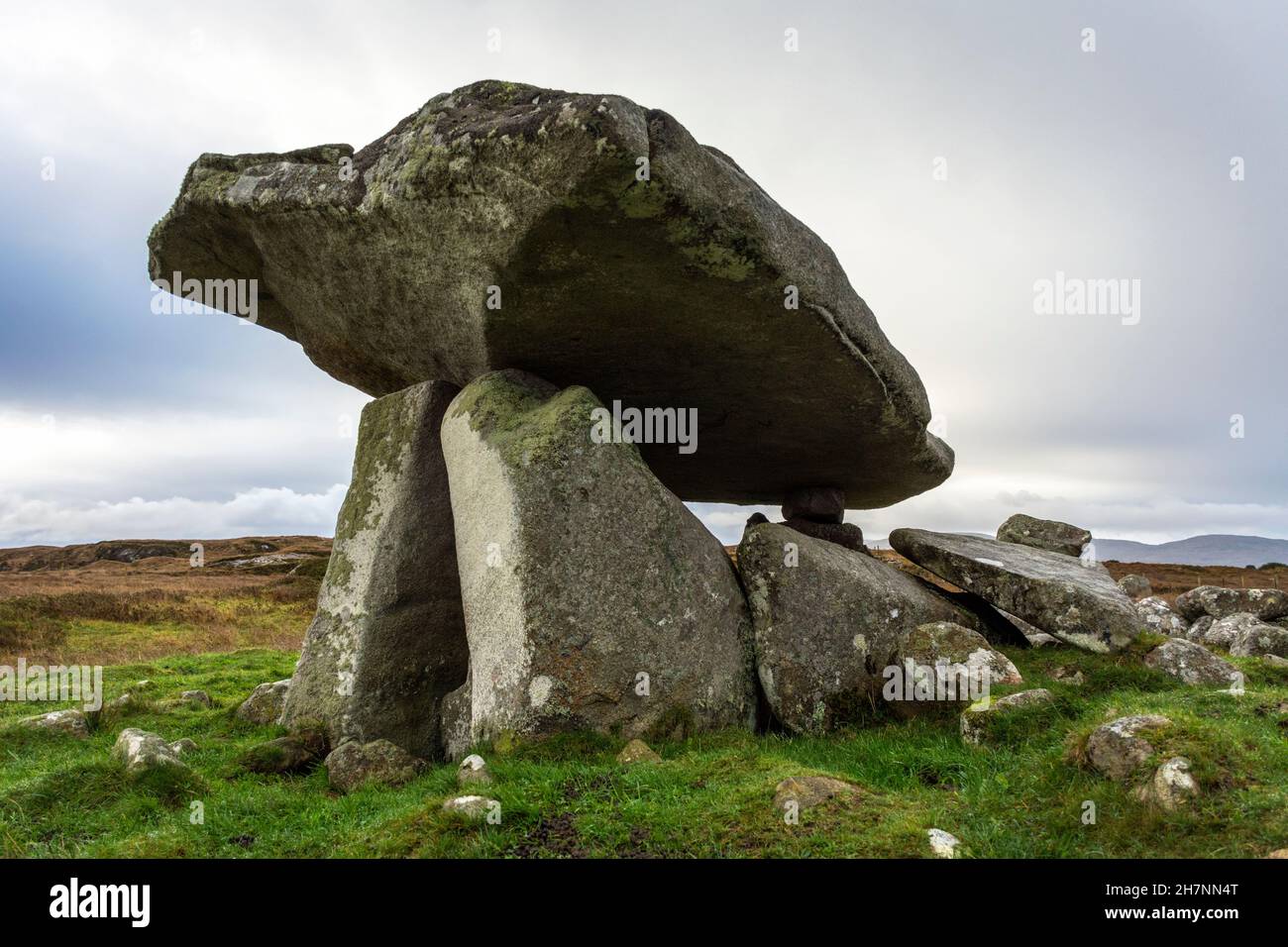 The Kilclooney Dolmen  fine portal-tome or dolmen, prominent on the skyline north-west of Ardara in County Donegal, Ireland. 3500 years old. Stock Photo